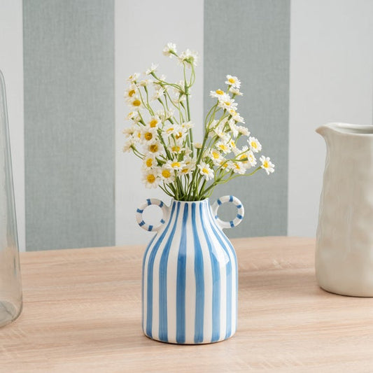 Artificial Daisies in a Ceramic Vase