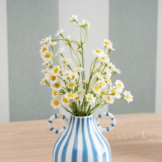 Artificial Daisies in a Ceramic Vase