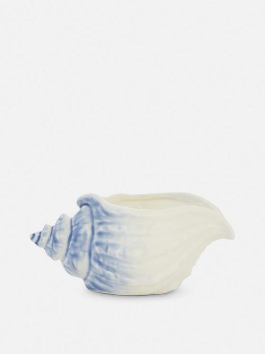 Candle In Ceramic Shell